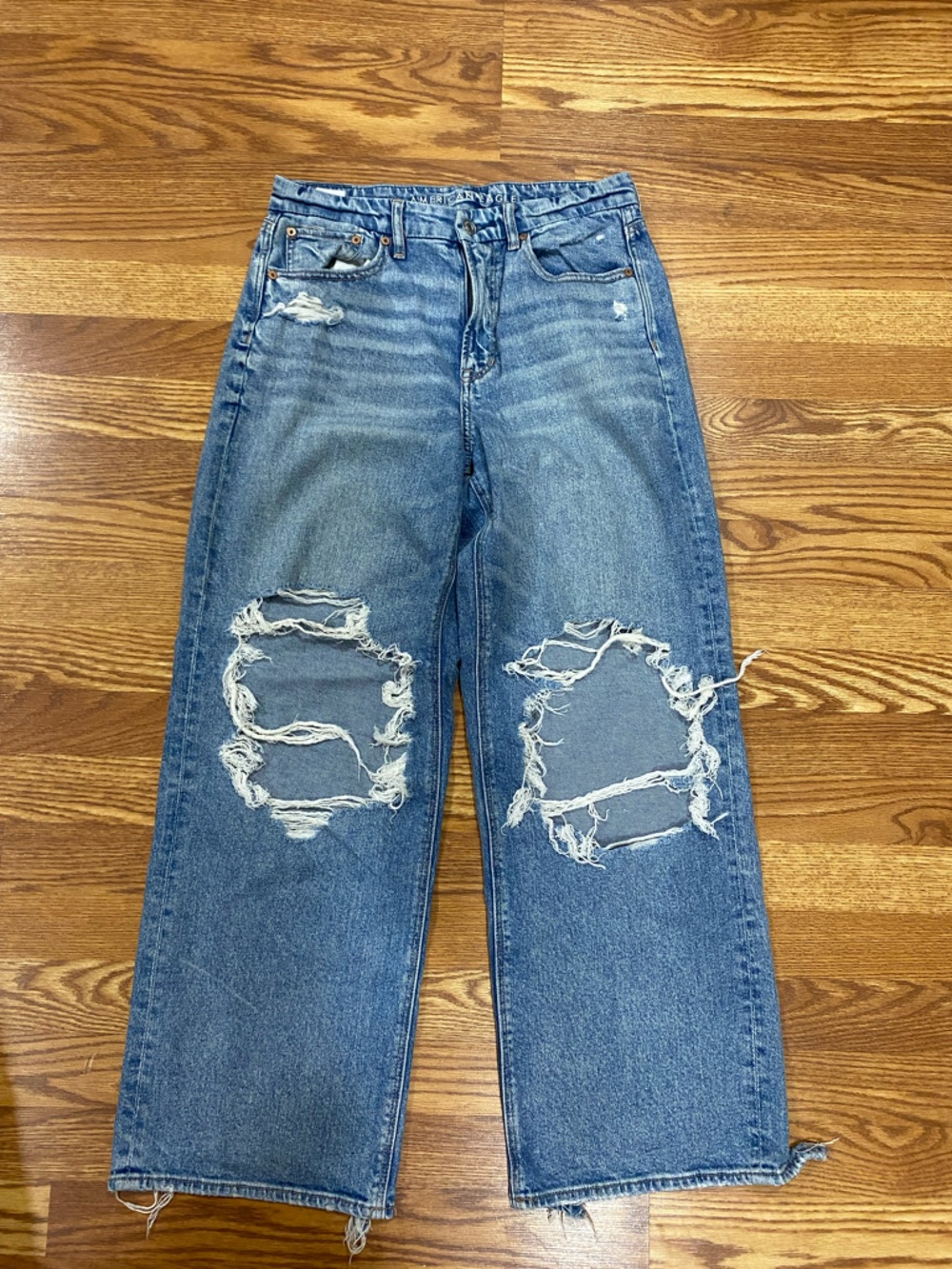 American Eagle curvy super high-rise baggy straight Distressed Jeans.
